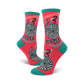 pink and teal women's crew socks with committed...cycle therapy in teal and black and a bicycle image   