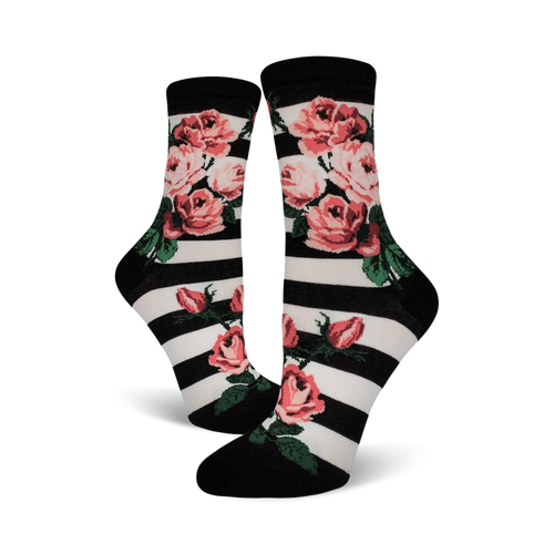 Close-up of Romantic Rose socks featuring a black and white striped background with pink roses.