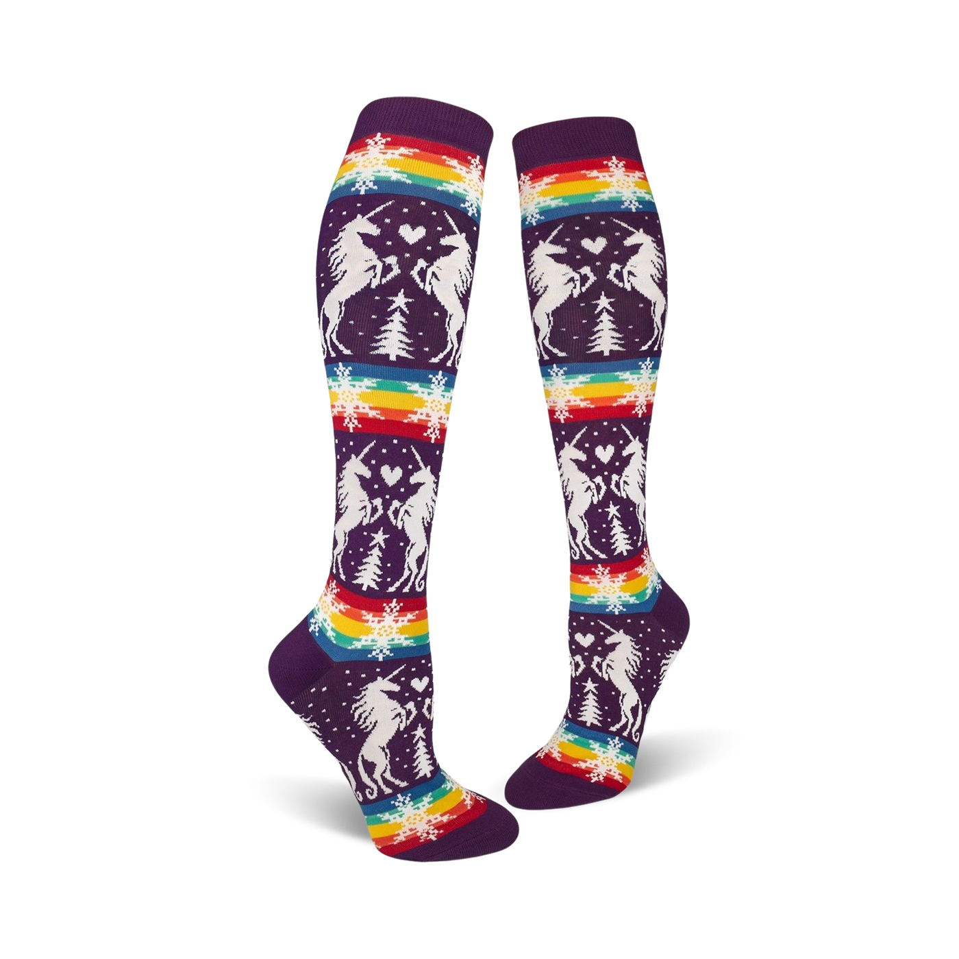 Pair of purple knee-high socks with a whimsical design featuring white unicorns, snowflakes, rainbow stripes, and small pine trees.