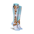Close-up shot of the giraffe knee-high socks, highlighting the detail of the giraffe's face and pattern.