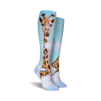Close-up shot of the giraffe knee-high socks, highlighting the detail of the giraffe's face and pattern.