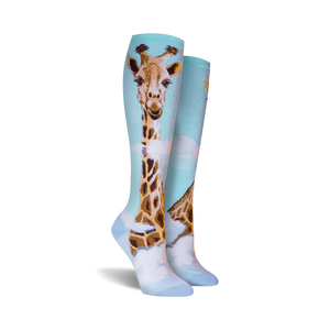 A pair of blue knee-high socks with a giraffe pattern.
