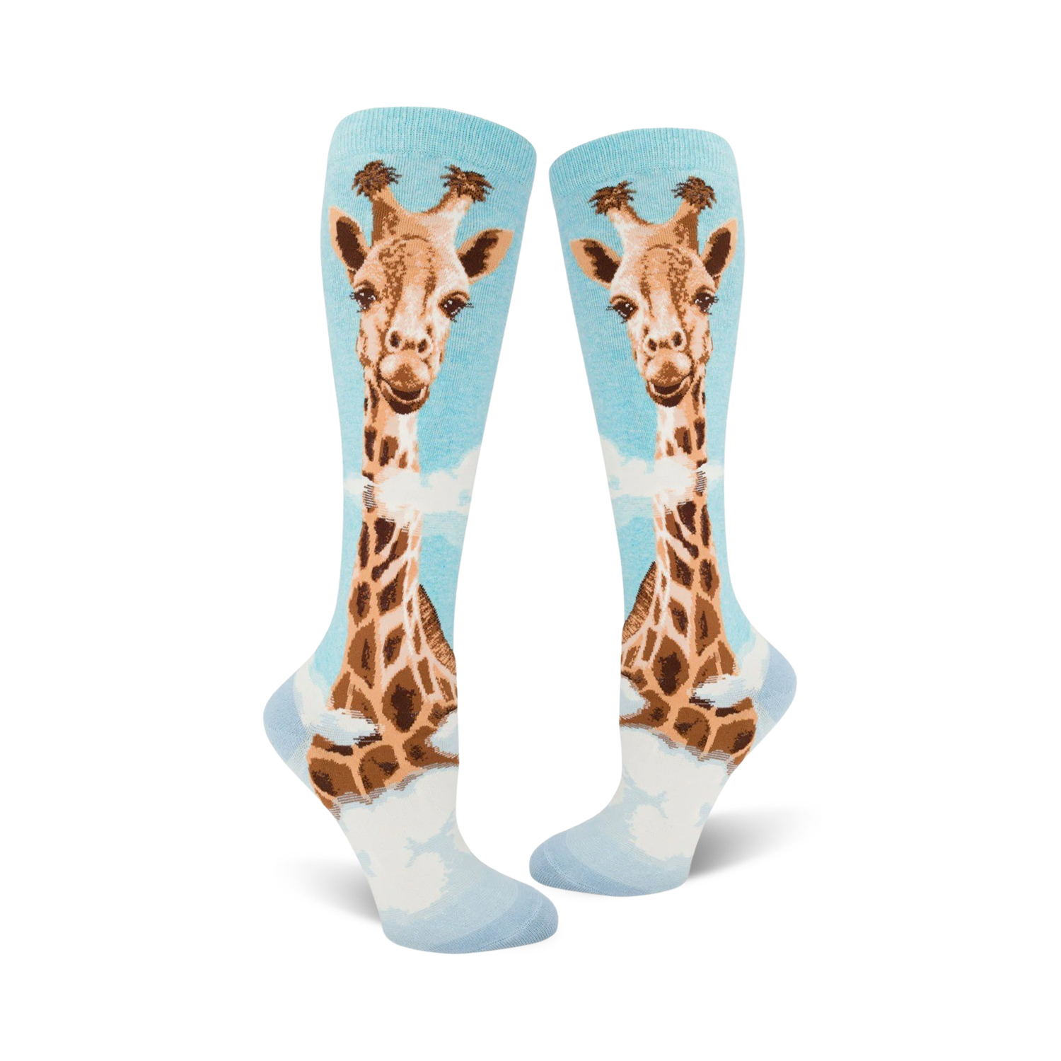 Pair of women's knee-high socks. Light blue background with a whimsical giraffe design in shades of brown and tan.