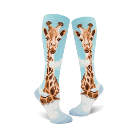 light blue knee-high women's socks featuring a giraffes head and neck running the length of the socks