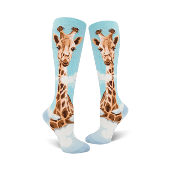 light blue knee-high women's socks featuring a giraffes head and neck running the length of the socks