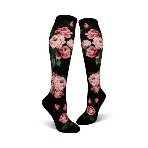 Pair of women's knee-high socks. Black background with pink roses and green leaves. One pair features black and white stripes.