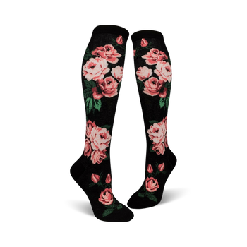 black knee-high socks with repeating pink rose and green leaf design.  