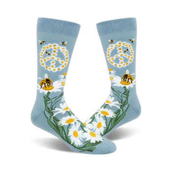 mens crew socks with a pattern of bees, flowers, and peace signs on a blue background.  