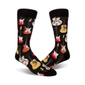 A pair of black crew socks with a colorful guitar pattern.  Red, yellow, and white guitars are featured on a black background.