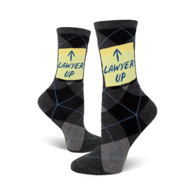 gray crew socks featuring a yellow sticky note graphic with the phrase '{lawyer up}' for a humorous take on the legal profession.  