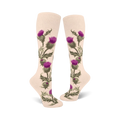 Pair of cream knee-high socks adorned with a vertical pattern of purple thistles and green leaves.