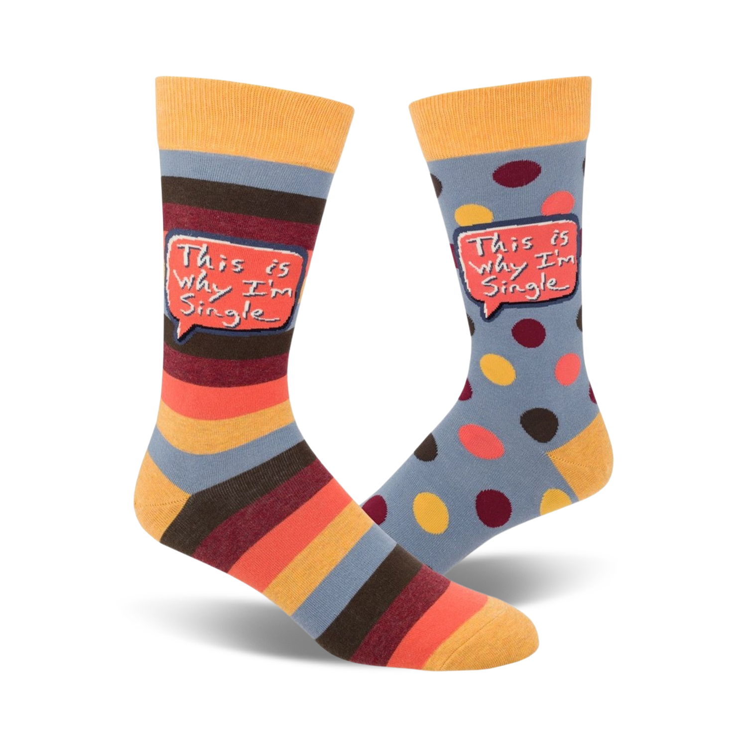 Crew socks in blue, orange, and brown. One sock has horizontal stripes, the other has polka dots. Both socks feature a speech bubble saying 'This is why I'm single'.