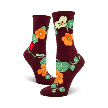 dark red socks with orange, yellow, and red nasturtium blossoms and green leaves.  