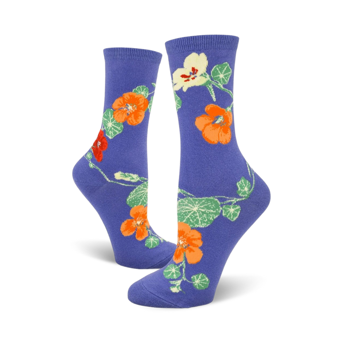 purple crew socks with an all-over pattern of orange, yellow, and red nasturtium flowers on green stems and leaves.  