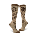 A pair of beige knee-high socks with a brown Ouija board design. The socks feature a sun, moon, and alphabet graphics.
