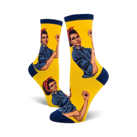 yellow crew socks featuring rosie the riveter, an iconic symbol of girl power, in blue and red.  