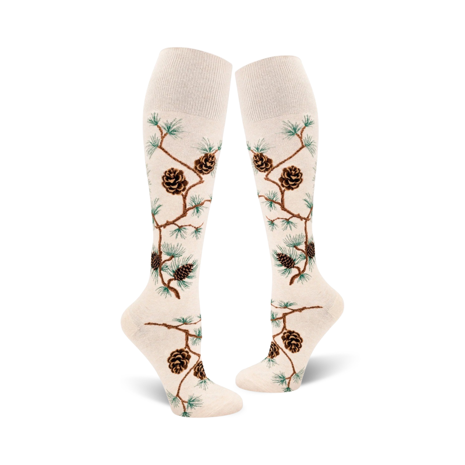 Pair of off-white knee-high socks with brown pine cones and green pine branches artfully arranged on the fabric.