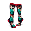 Knee-high socks with a repeating pattern of Rosie the Riveter wearing a face mask, in teal, red, and black.