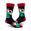 Crew socks with a navy blue background, featuring a Rosie the Riveter-style nurse wearing a mask, in teal scrubs, with red polka dot bandana.