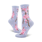 Lifestyle shot showing the lavender-colored Cherry Blossom socks on a model's feet.