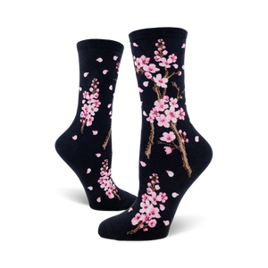  black socks with pattern of pink cherry blossoms. floral crew socks for women.  
