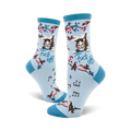 Crew socks in light blue with a cute kitty, birds, musical notes, and the phrase 'Fuck Off' printed on them.