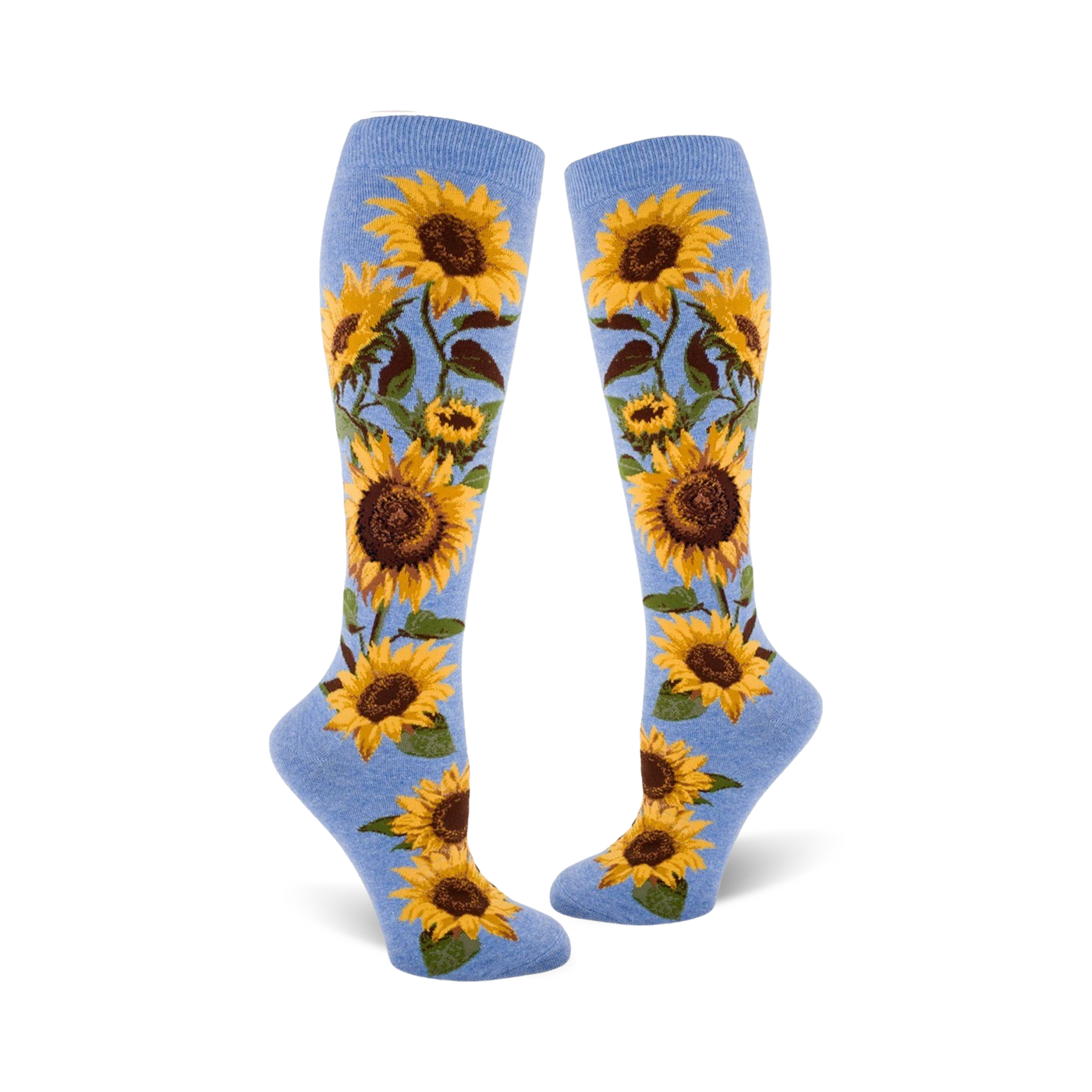 Lifestyle shot showing a person wearing the blue sunflower knee-high socks. They're styled with jeans and sneakers.