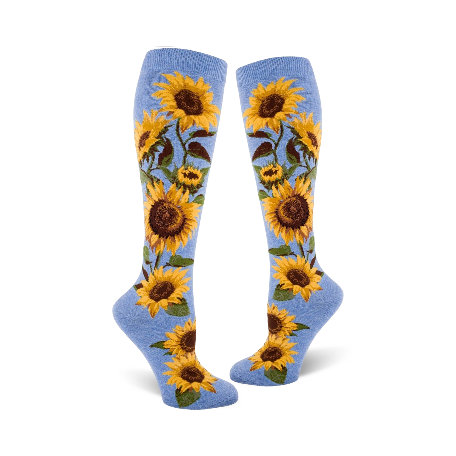 Lifestyle shot showing a person wearing the blue sunflower knee-high socks. They're styled with jeans and sneakers.