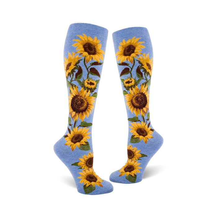 knee high socks with sunflower print in yellow, orange, and green.   