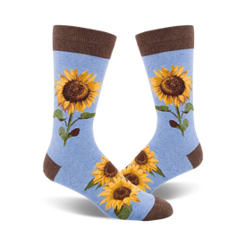 blue crew socks with brown cuff and yellow sunflower pattern.  