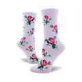 Pair of lavender crew socks with a pattern of pink roses, green leaves, and tiny white flowers.