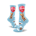 A pair of crew socks in light blue with a repeating pattern of a teddy bear holding a red 'F**k My Life' balloon and small birds in flight.