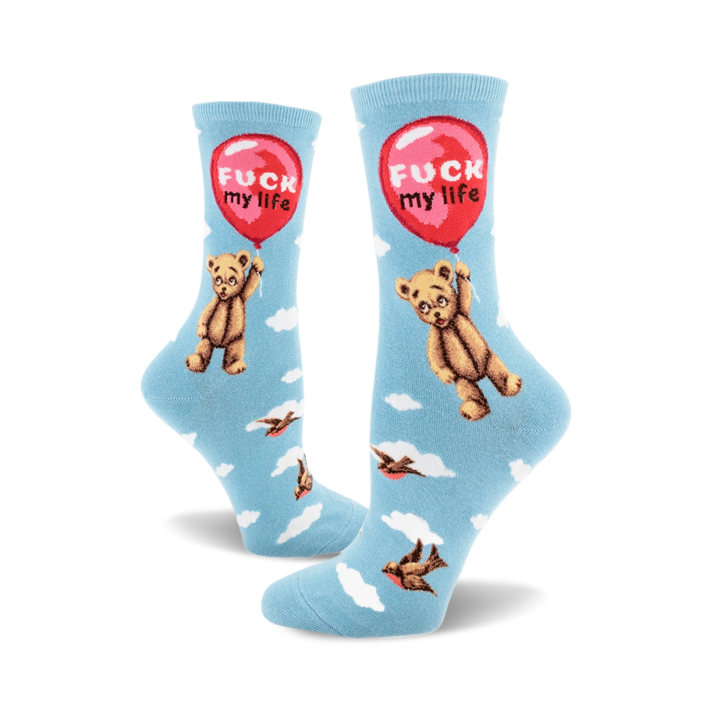 A pair of crew socks in light blue with a repeating pattern of a teddy bear holding a red 'F**k My Life' balloon and small birds in flight.