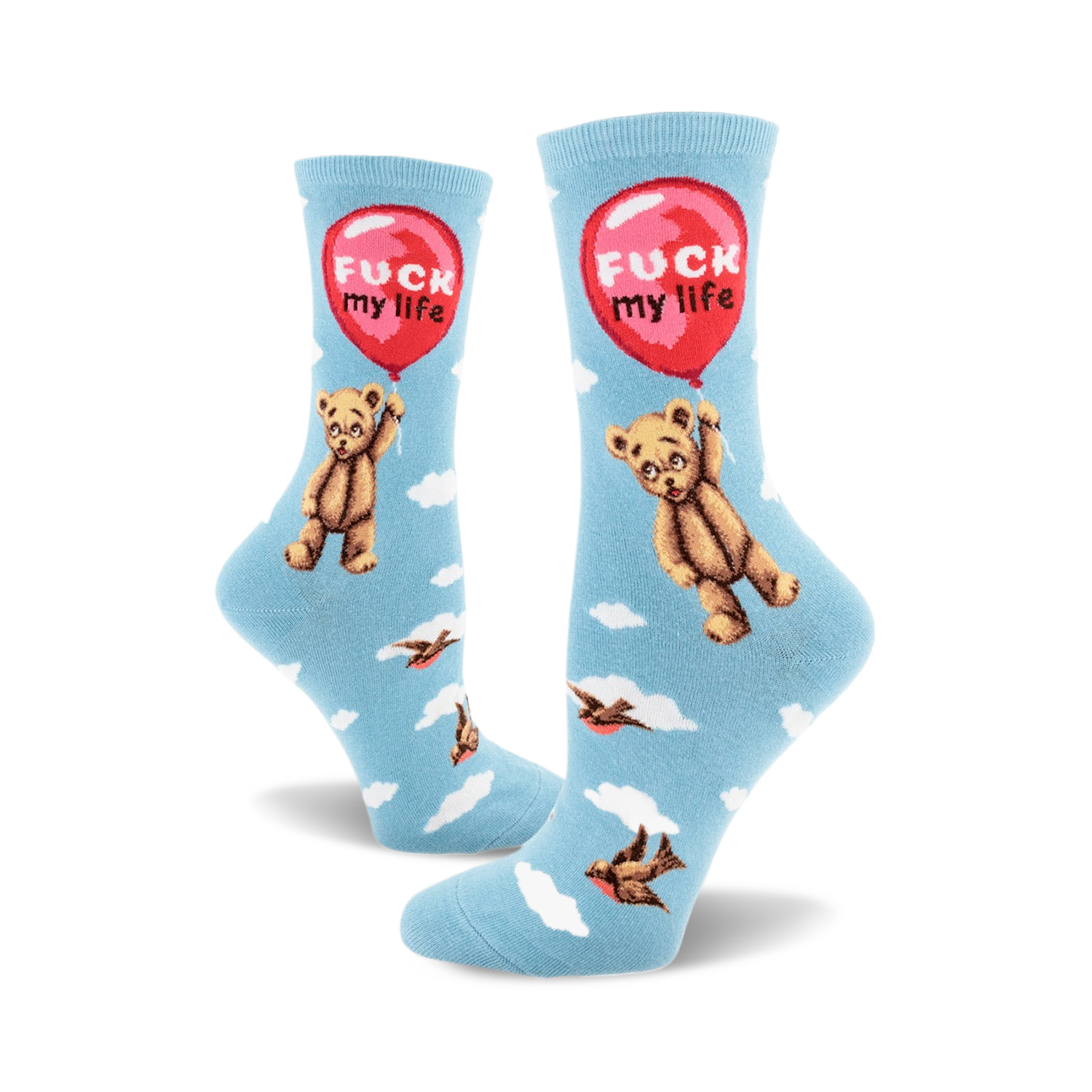 A pair of crew socks in light blue with a repeating pattern of a teddy bear holding a red 'F**k My Life' balloon and small birds in flight.