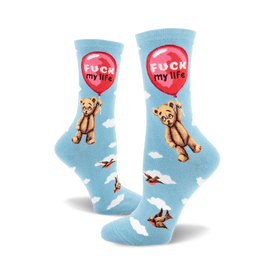 socks that are blue with a pattern of white clouds, black birds, and a brown teddy bear holding a red balloon with the words 'fuck my life' on it.
