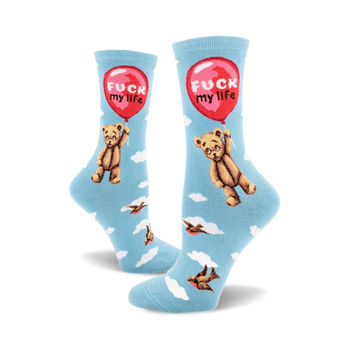 socks that are blue with a pattern of white clouds, black birds, and a brown teddy bear holding a red balloon with the words 'fuck my life' on it.
