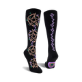 Black knee-high socks with repeating pentagram design entwined with purple flowers. One sock features a vertical flower pattern.