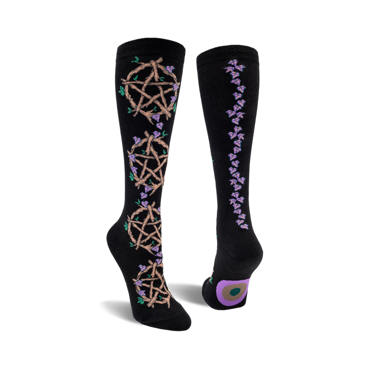 Black knee-high socks with repeating pentagram design entwined with purple flowers. One sock features a vertical flower pattern.