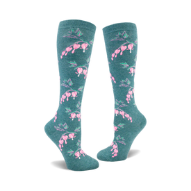 front view of a pair of teal knee-high socks with pink bleeding heart flowers.