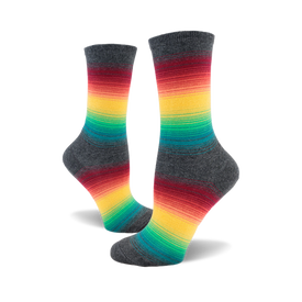 front view of a pair of grey socks with rainbow stripes.