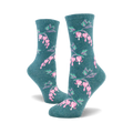 Pair of teal crew socks with a repeating pattern of pink bleeding heart flowers and green stems.