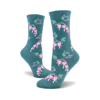 side view of two teal crew socks with a pink bleeding heart flower pattern.