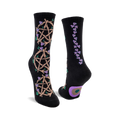 Black crew socks with a beige pentagram and purple flower design on one side and a line of purple flowers on the other.  A small circle design is on the heel.