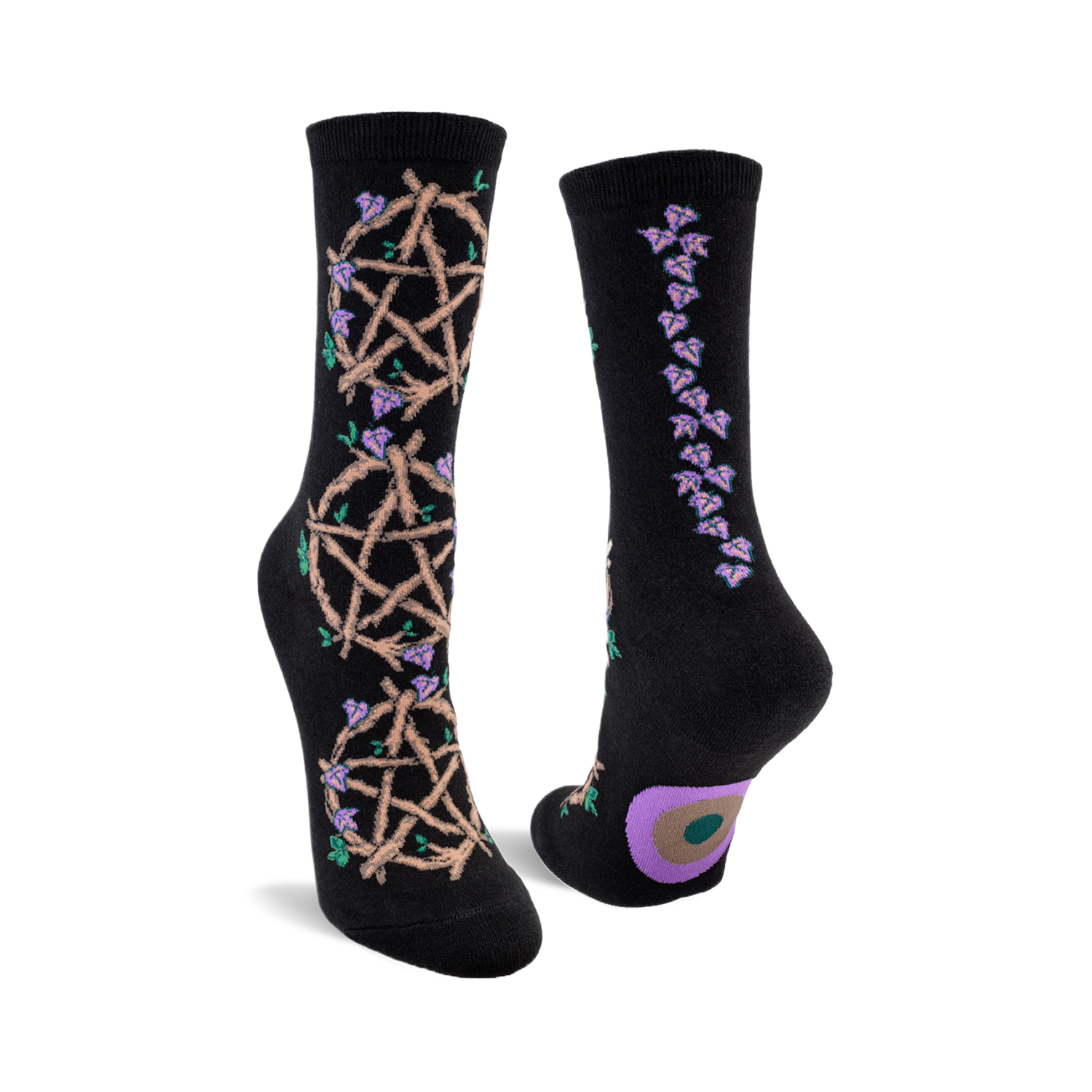 Black crew socks with a beige pentagram and purple flower design on one side and a line of purple flowers on the other.  A small circle design is on the heel.