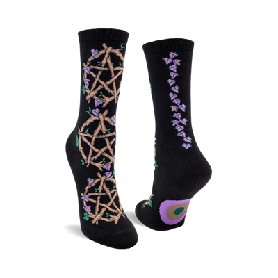 front view of black crew socks with a pentagram and vines on them.