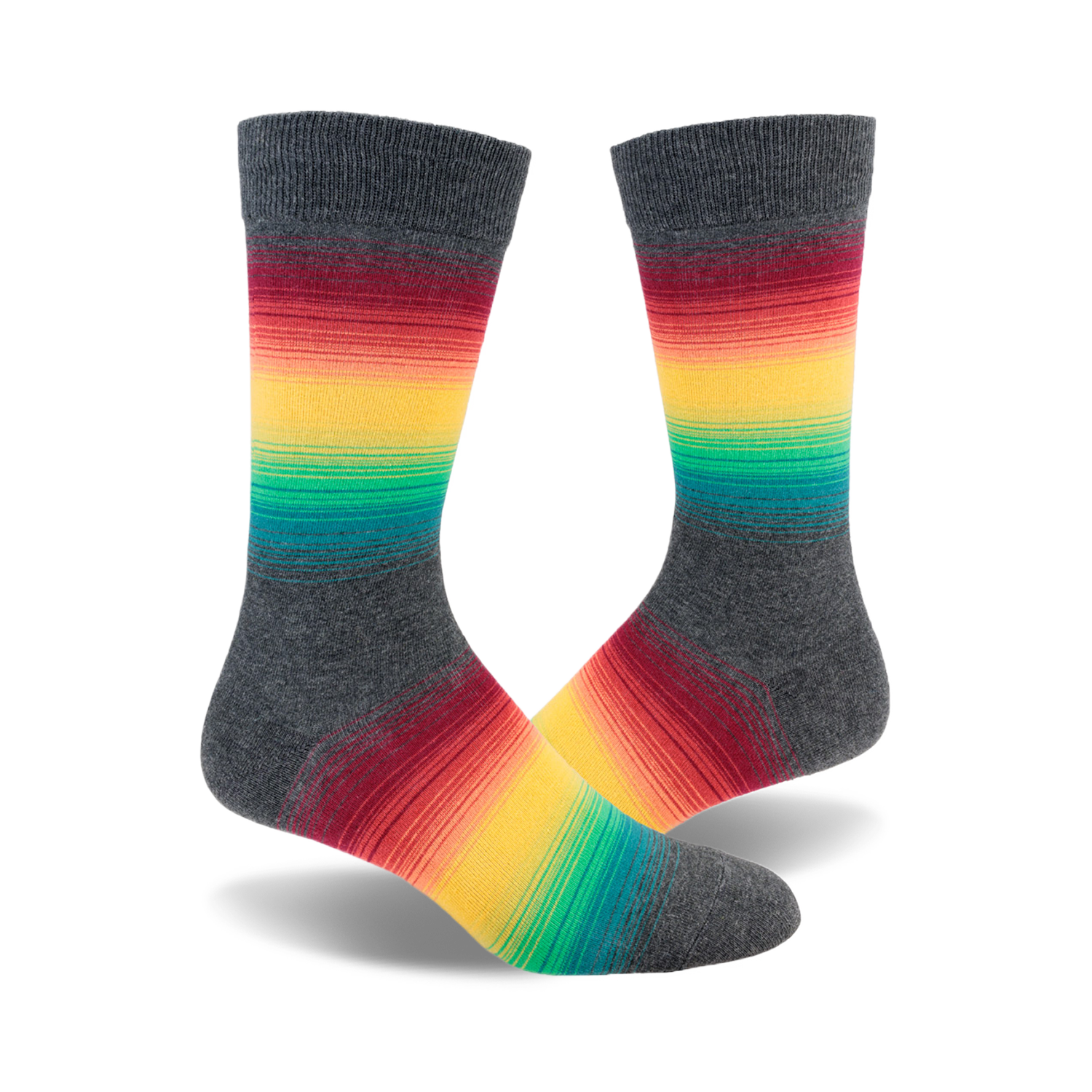 Pair of crew socks in charcoal grey with a horizontal dark rainbow stripe design.  Colors include red, orange, yellow, green, and teal.