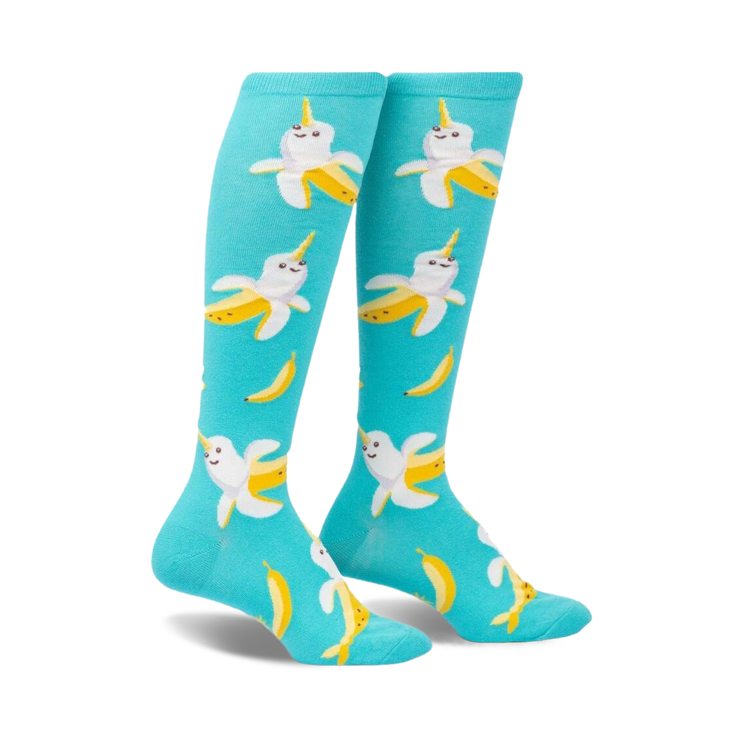 Pair of teal knee-high socks with a whimsical pattern of smiling banana-narwhals. 