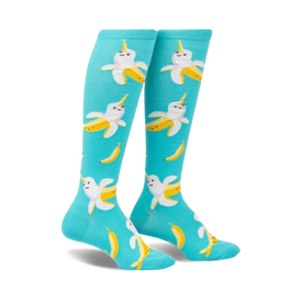blue knee-high socks with white narwhals with banana-shaped bodies, horn. for women.  