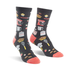 Pair of crew socks in dark gray with coral toes and heels.  The socks are adorned with illustrations of kitchen tools, baked goods, and strawberries.