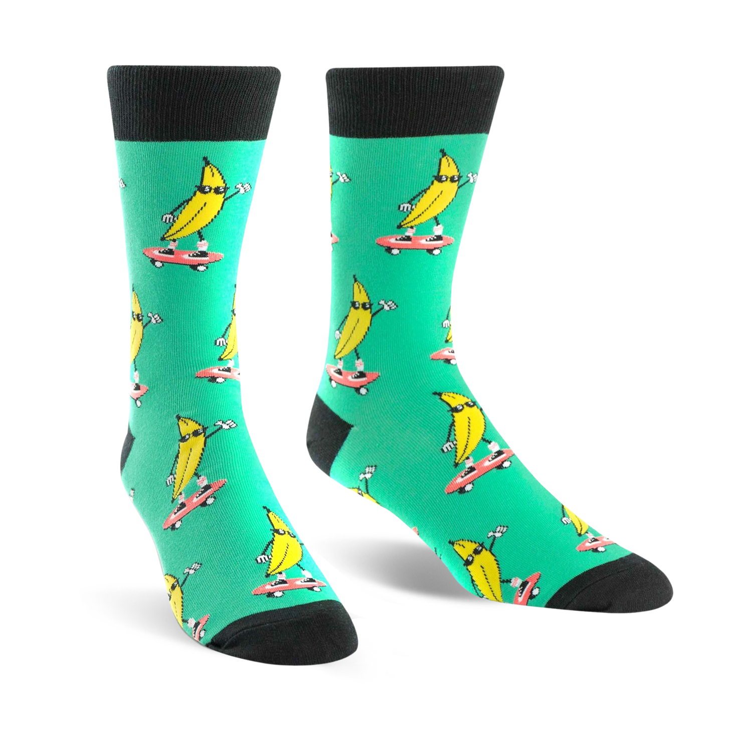 Crew socks in teal with a repeated pattern of yellow bananas skateboarding. Bananas wear sunglasses.